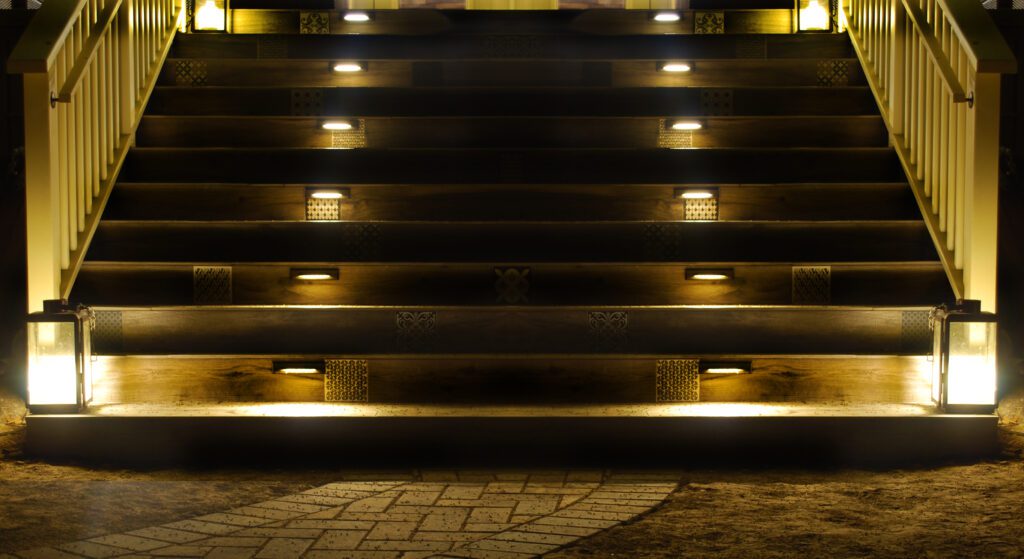 A picture of dim lights attached to the stairs